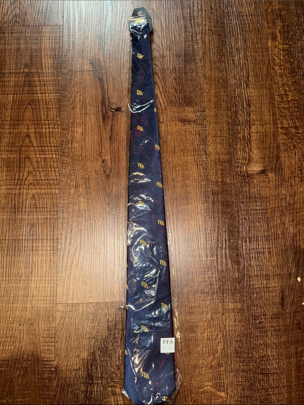 FFA Branded Navy Tie with Gold Emblem